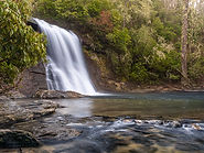 Mountain waterfall flowing into a rocky pool near Cashiers, North Carolina
