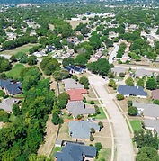 Calm suburban homes with lawns