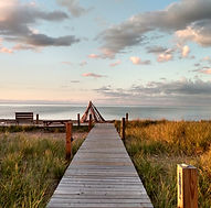 walkway with a beautiful scenic view of grass and ocean at Port Wing, WI
