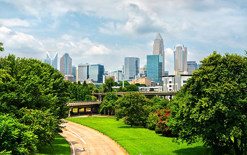 Charlotte Skyline Surrounded By Green Trees And Parkland, Charlotte, North Carolina