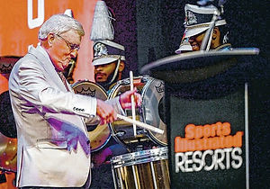 Pat playing drums at Sports Illustrated Resorts Announcement