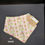 Thumbnail: Newborn handkerchief bib