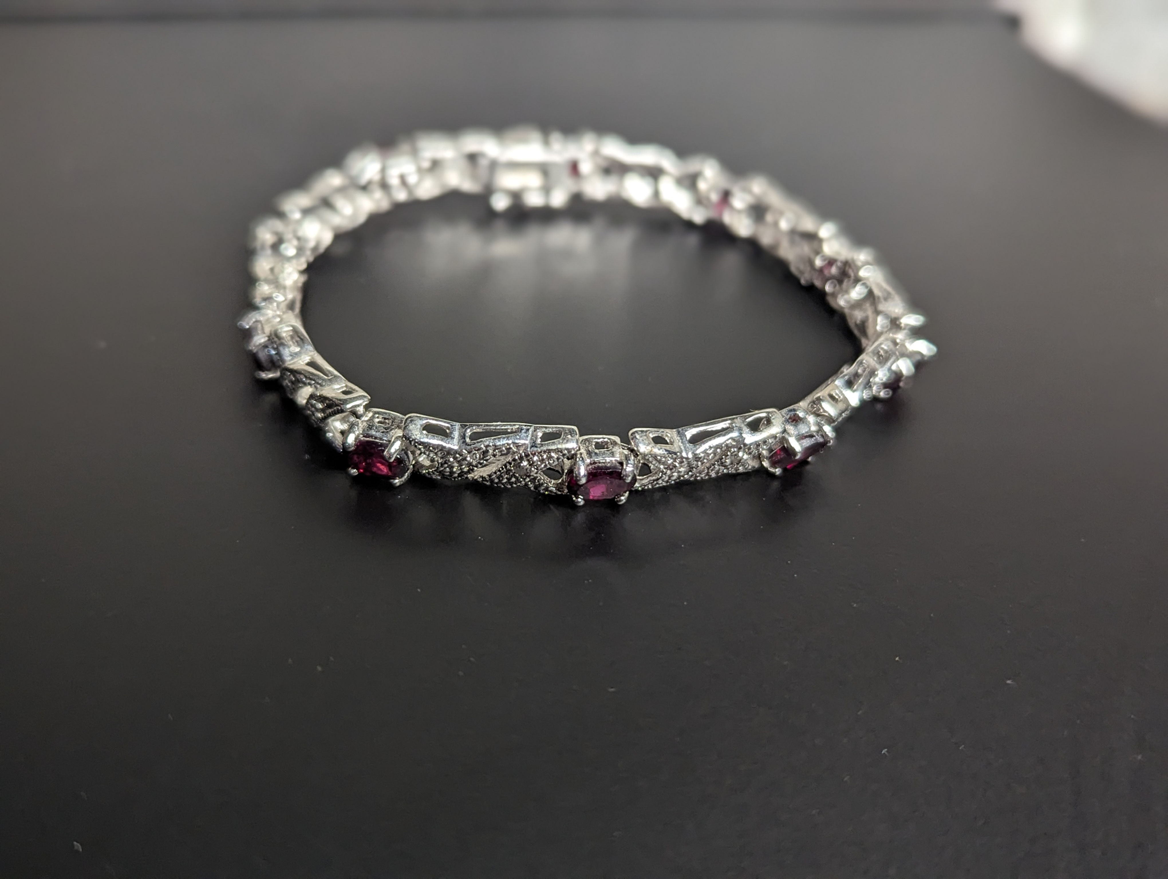 Sterling Silver Tennis Bracelet with Ruby Colored Stones