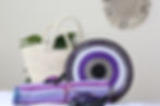 Gift package containing Purple Beaded placemat, purple kikoy towel, purple Soapstone turtles and basket