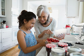 granddaugher and grandmother cooking