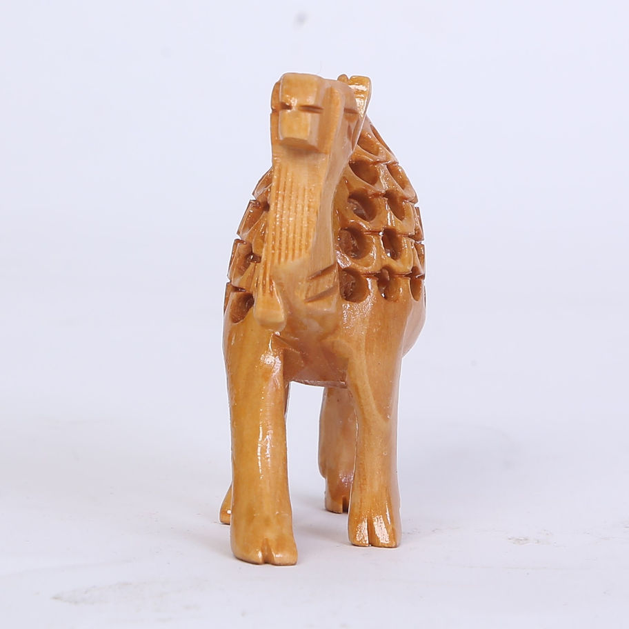 "Traditional wooden camel art piece, reflecting cultural heritage."