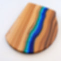 image of an cutting board that consists of wood and resin with vibrant colors like blue,