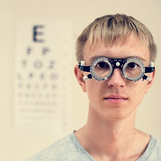 young-man-is-having-sight-testing-PLU3N9