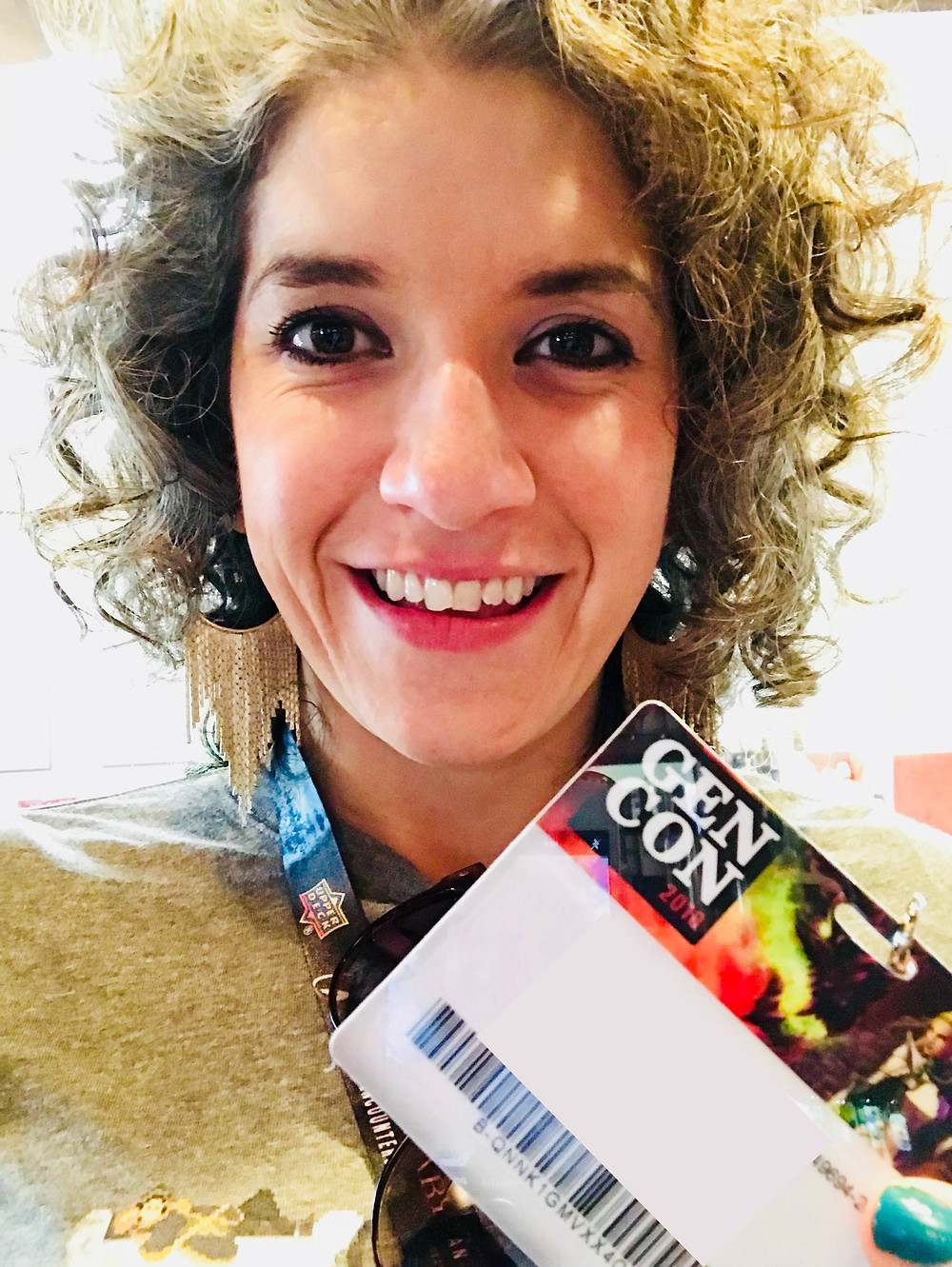 Picture of woman holding badge