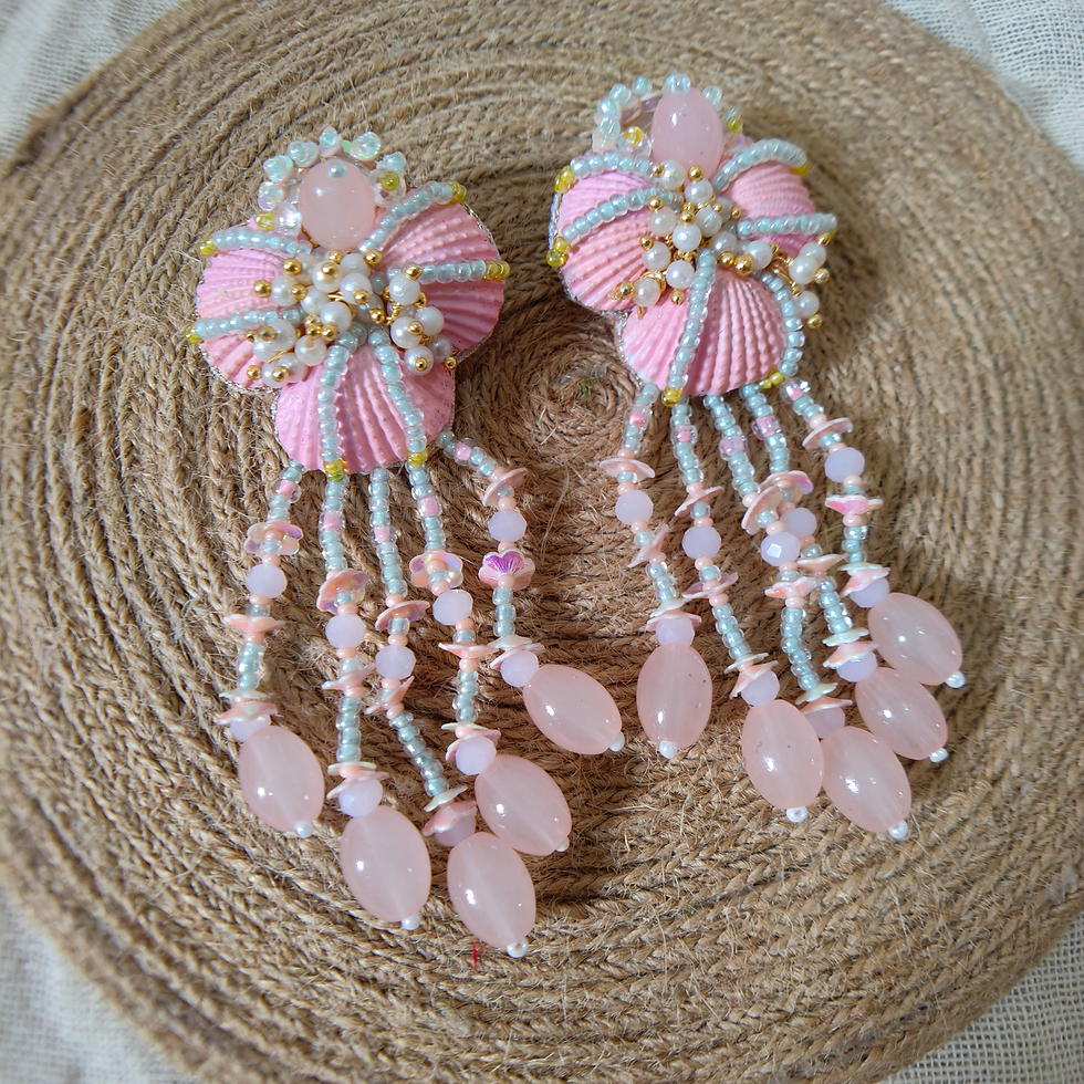 Thumbnail: The "Coral sunset" Rose shell earrings 