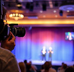 Scene of filming a live event (comedy show for example); no people holding camera .jpg