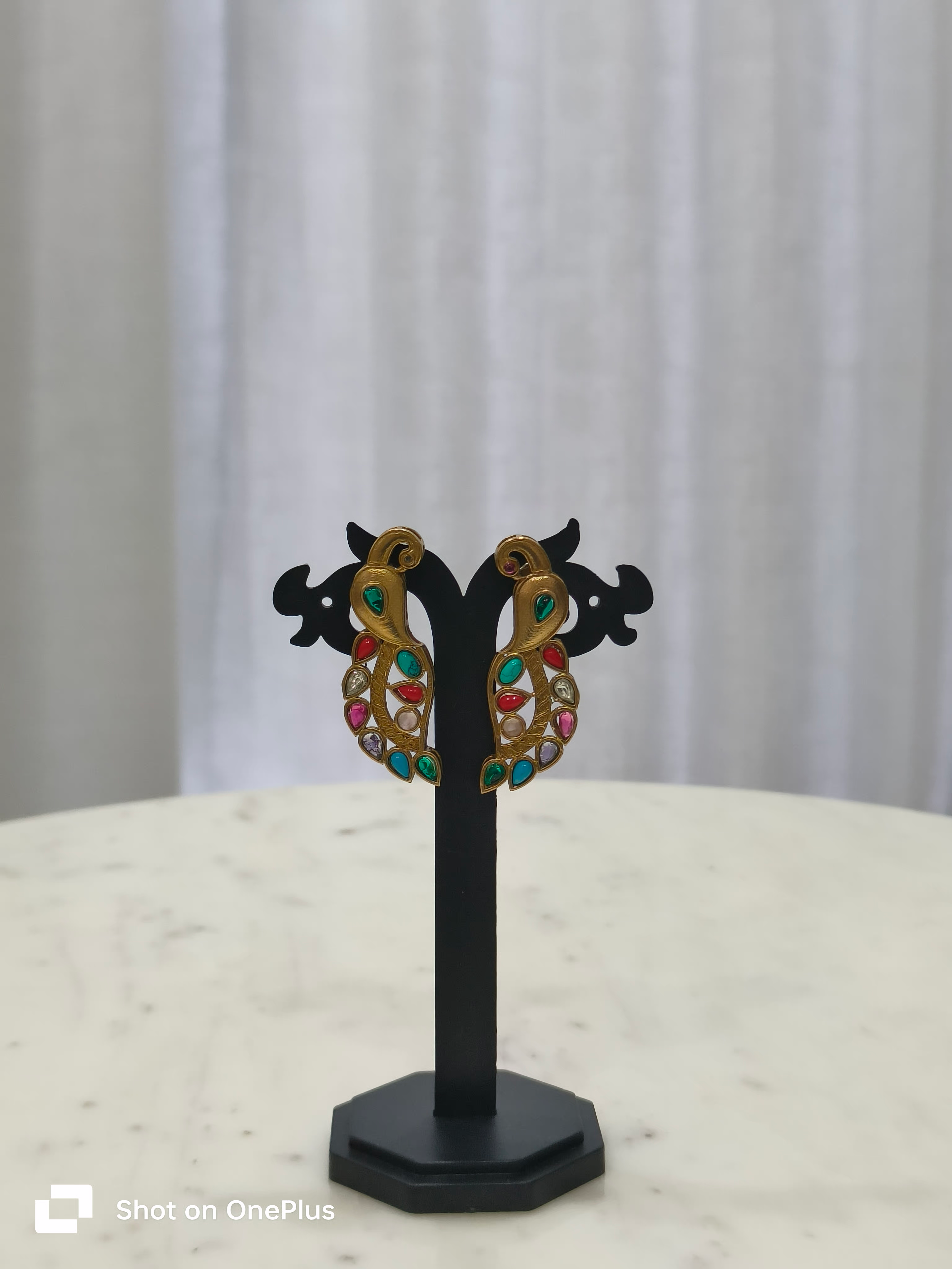 Navratna studs in apala polish 