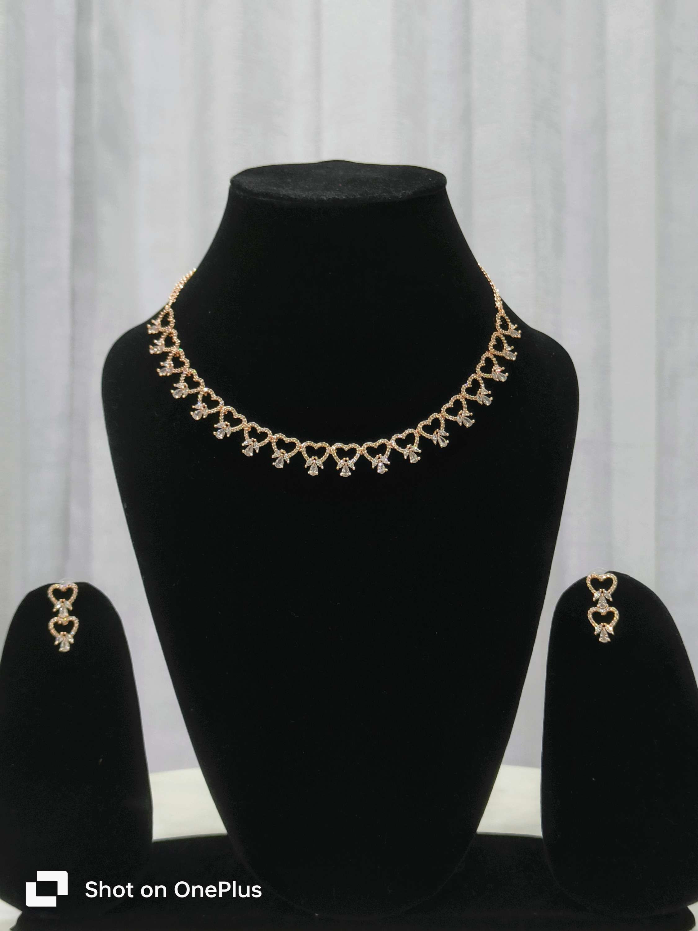 Sleek rose gold CZ set