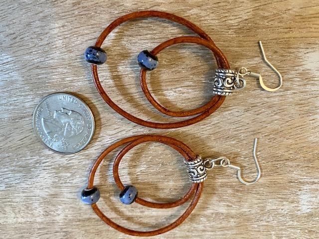 Thumbnail: Two Loop Leather Earrings With Blue Porcelain Beads