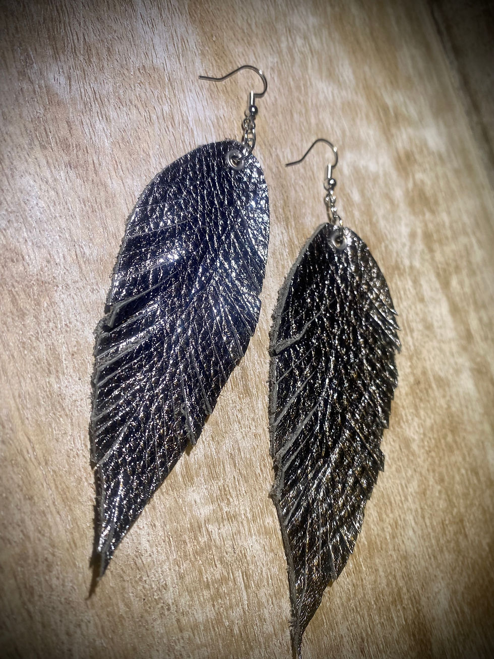 Thumbnail: Shinny Silver Leather Feathered Earrings