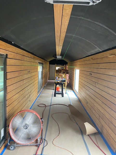 Finished Interior Wood Paneling of Whole Car- North End.jpeg