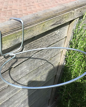 Fence Hook hanging on a fence panel
