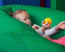 little girl with sensory toy.jpg