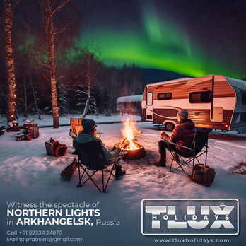 Two people by campfire under Northern Lights in Arkhangelsk, Russia. TLUX tours.