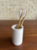 tranquil toothbrush holder with toothbrushes inside