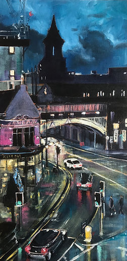 Deansgate Nocturne, A slice of city life, captured from Deansgate-Castlefield station one cold December afternoon just as the light was fading. Sparkling lights hold the promise of a warm welcome from the Atlas bar, while commuters hurry home