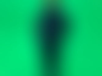 Mo Laudi, South African Afro house DJ and producer, against a green background