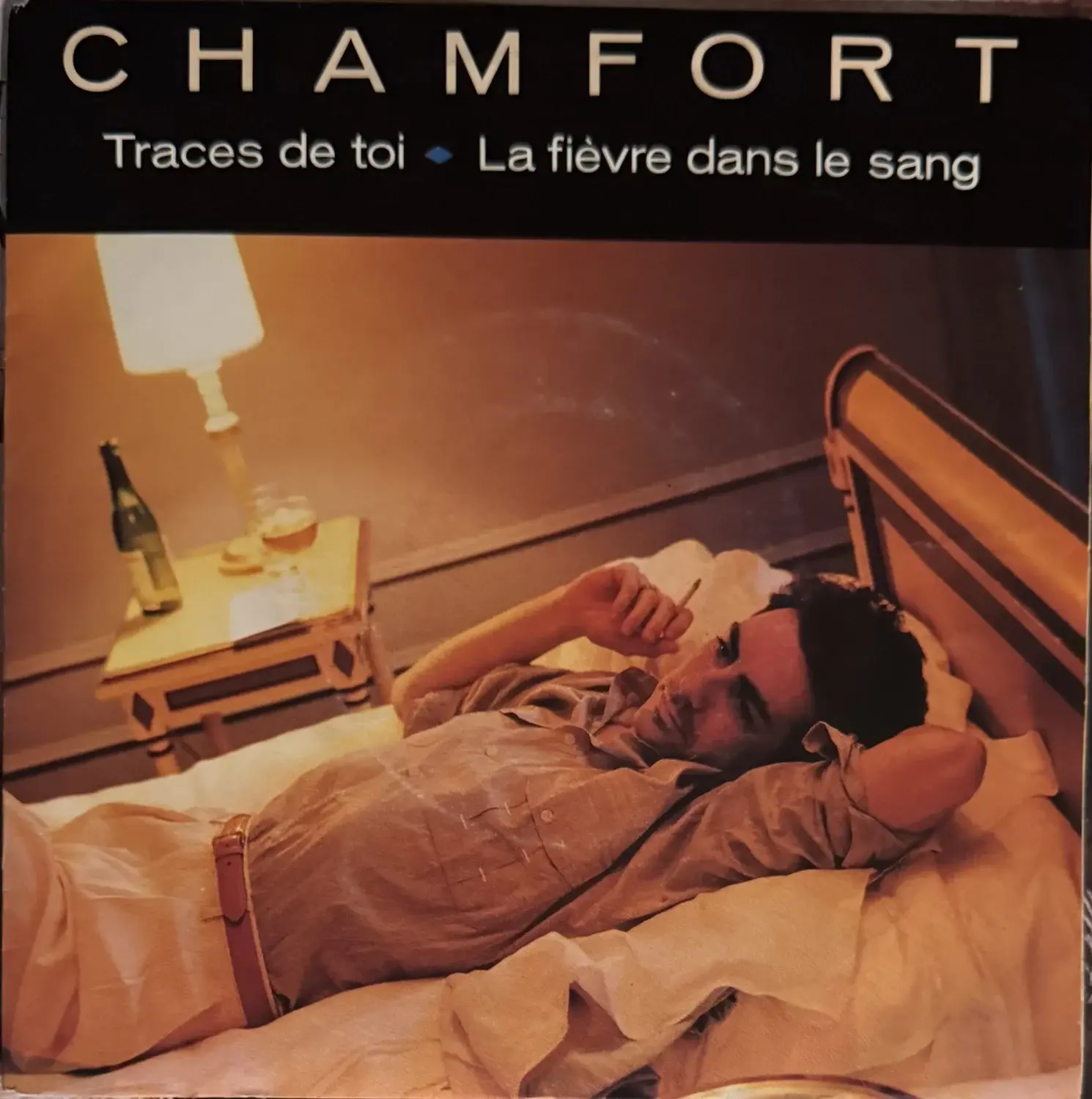 Disque vinyle de Alain Chamfort - Traces De Toi / La Fièvre Dans Le Sang en vente sur Vinyles & Vintage