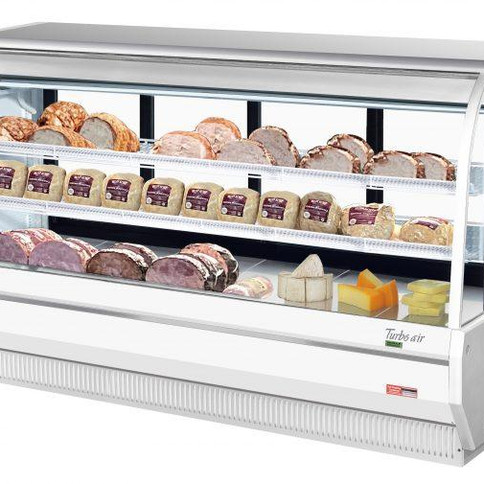 Deli display cabinet showcasing various meats and cheeses for sale in store.