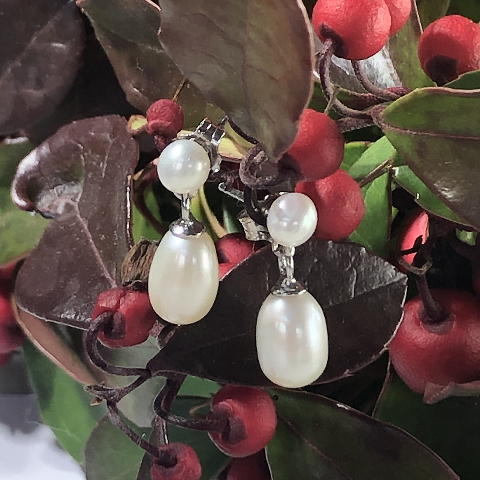 White Drop freshwater pearl. On sterling silver stud .