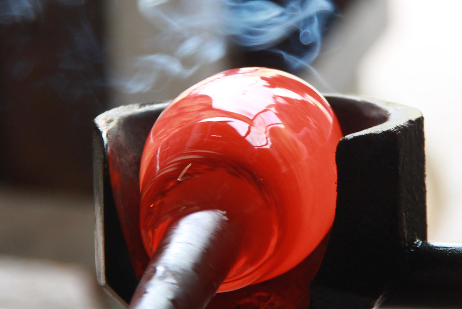 Red hot glass being shaped