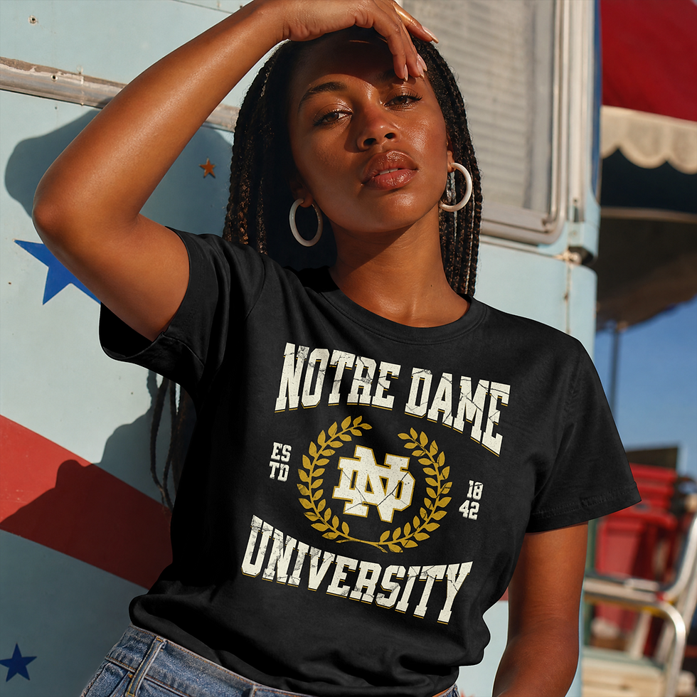 Person wearing the Daily Bread Notre Dame graphic tee beside a train.