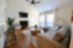 Spotless living room with dust-free surfaces cleaned by The HomeMaid Way Company in The Woodlands, T