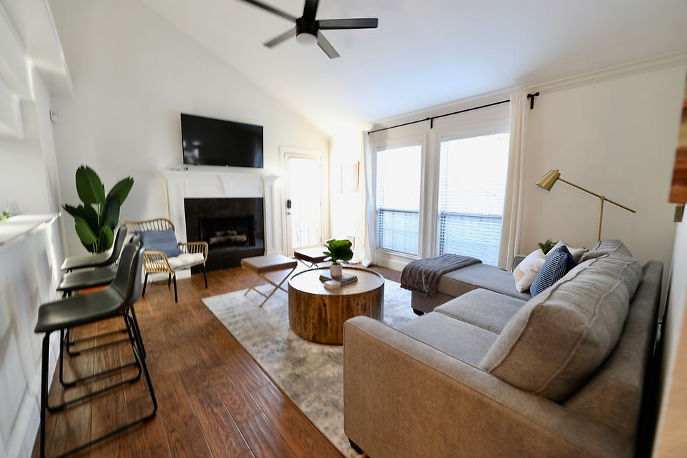 Spotless living room with dust-free surfaces cleaned by The HomeMaid Way Company in The Woodlands, T
