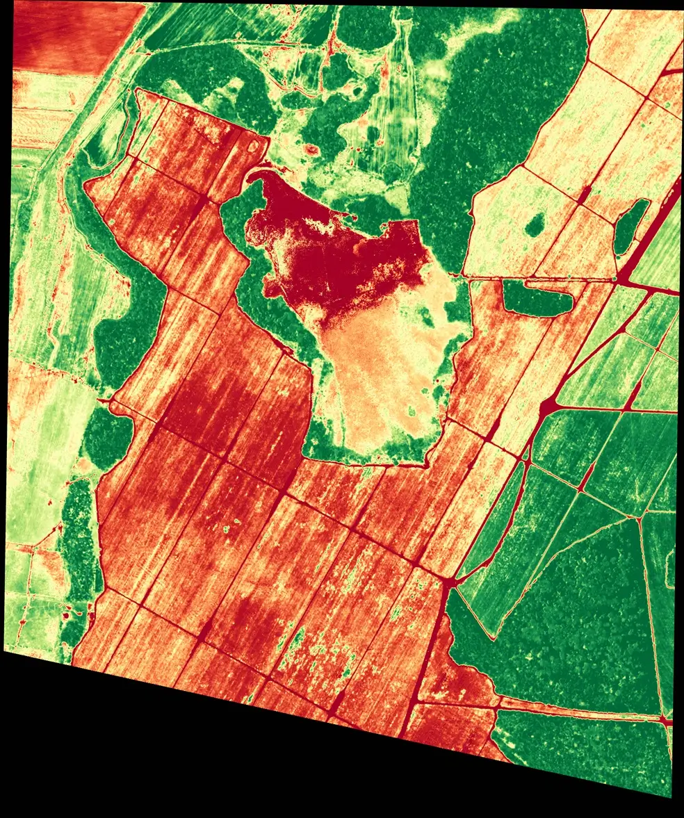 High-resolution satellite image showing agricultural fields in Mato Grosso, Brazil. The image captures detailed visual information about the landscape, including clearly defined crop areas, forested regions, and various land cover types