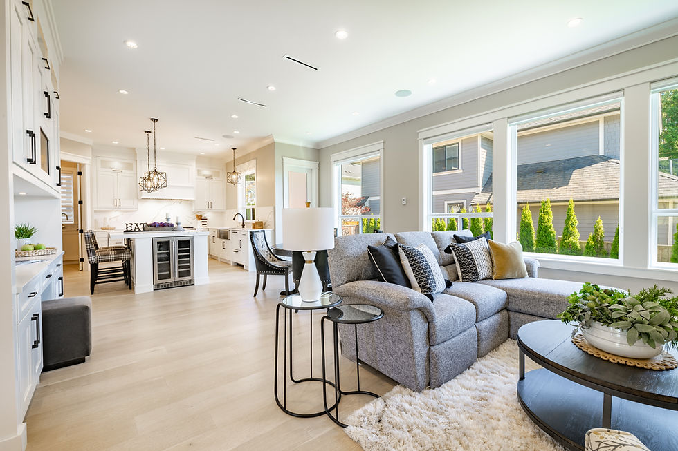 living room interior with stone fireplace large flat screen tv on white wall bright sunny