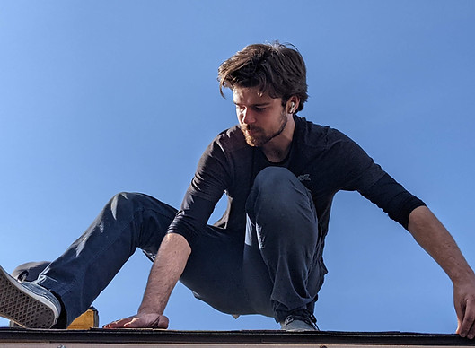 Roof-Ex Operations Manager and Lead Installer performing roofing repairs in Calgary