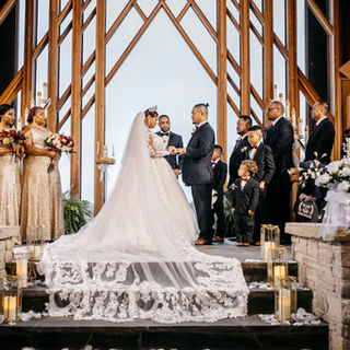 Wedding photo of a Kansas couple getting married at the Powell Gardens Allen Chapel. 