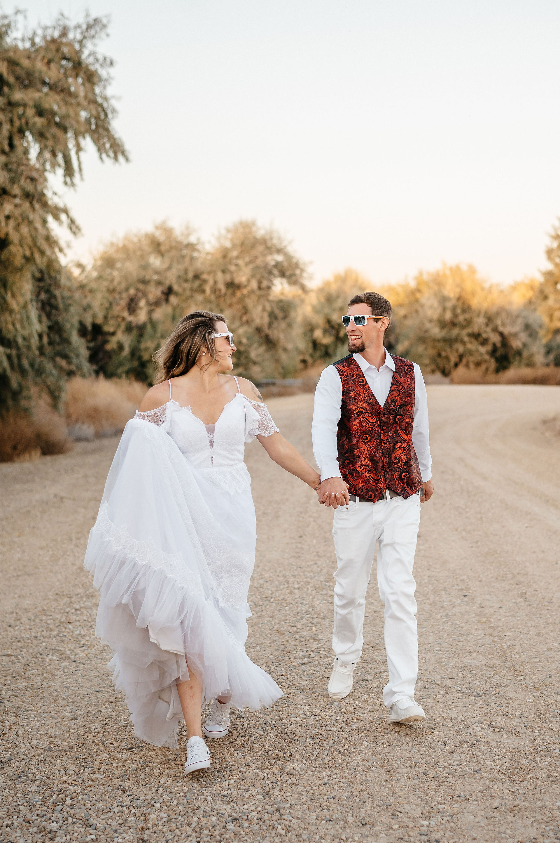 Idaho wedding couple running on their wedding day. 