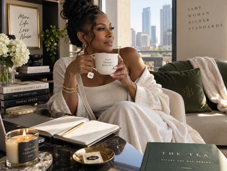 Woman enjoying morning tea in an elegant, relaxed home setting