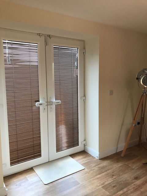 French doors with Venetian blinds