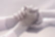 Hand being held in a caring way