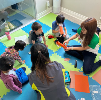 Children learning Cantonese and having fun