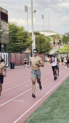 A Sidewalk Athletics Track Club member running at Gettler Stadium