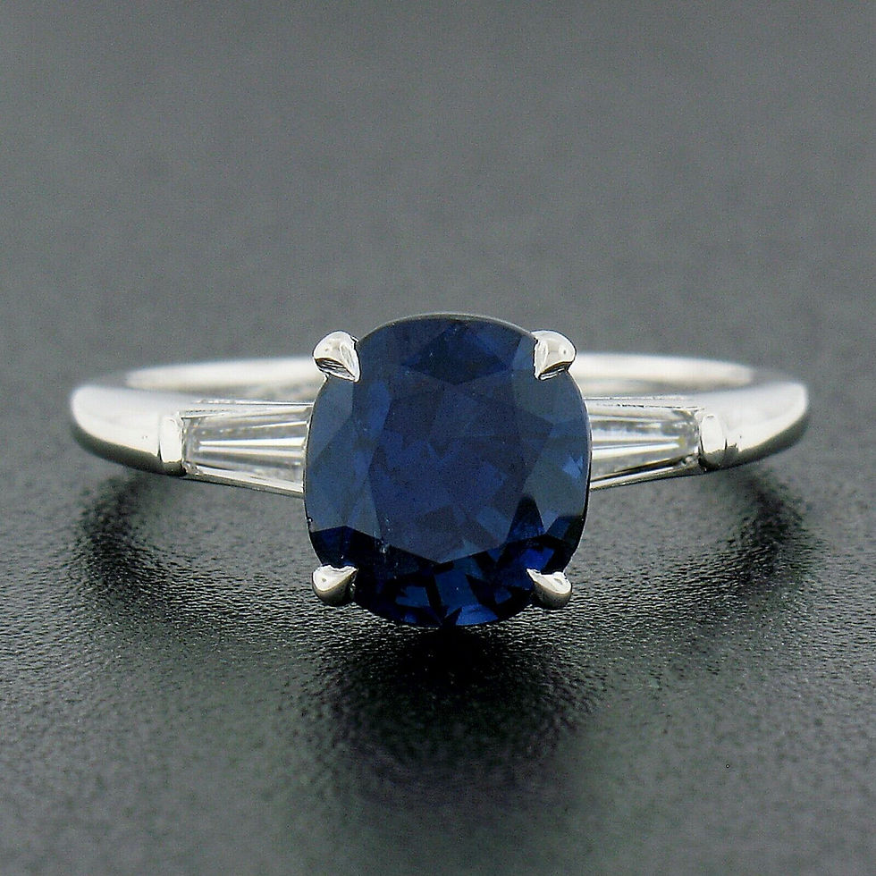 Thumbnail: Vintage Platinum 2.85ctw Oval Sapphire and Baguette Diamond Engagement Ring
