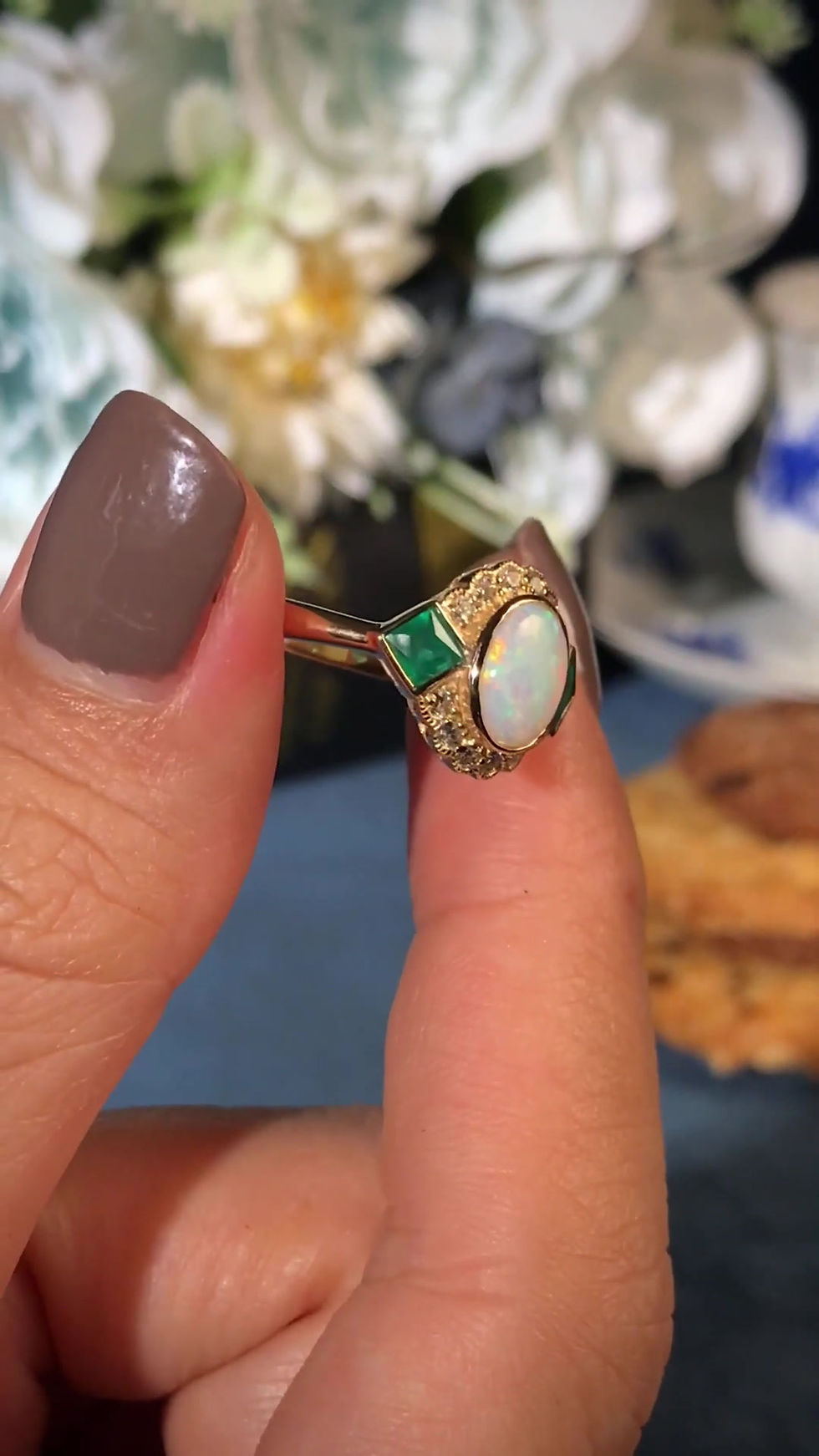 Thumbnail: Antique Inspired 14k Yellow Gold Oval Cabochon Opal Emerald & Diamond Halo Ring