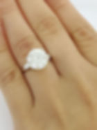 Vintage Platinum 3.80ctw Round Brilliant and Baguette Cut Diamond 3 Stone Ring
