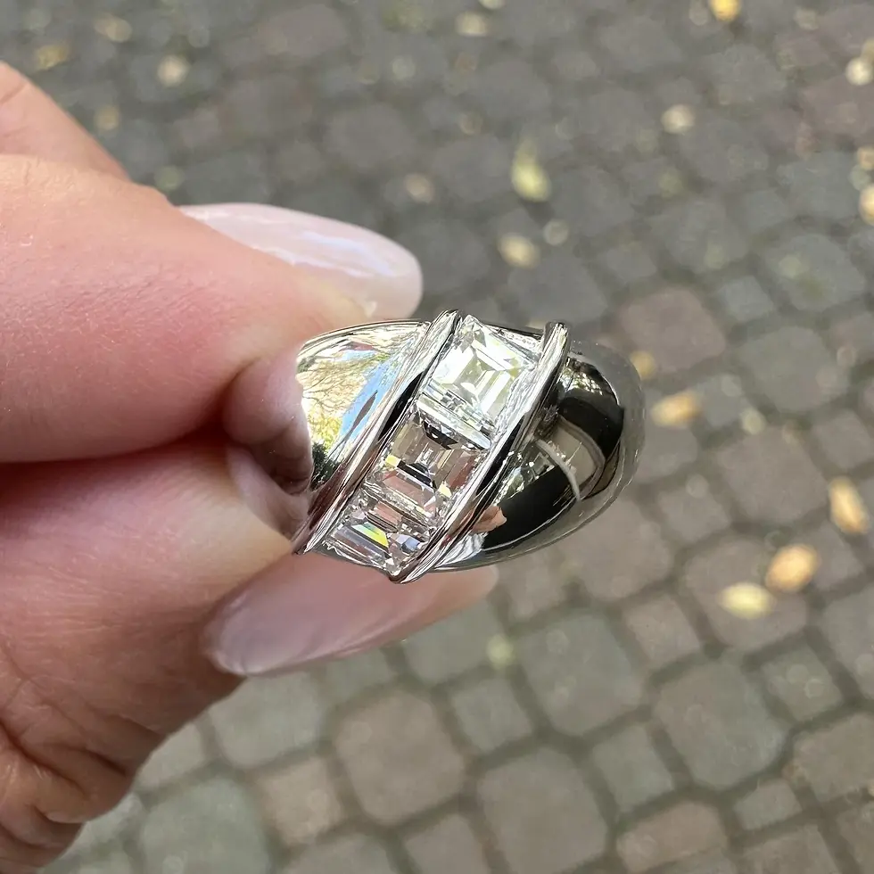 Thumbnail: Platinum 1.04ctw Step Carré Cut Channel 3 Diamond Wide Dome Band Ring