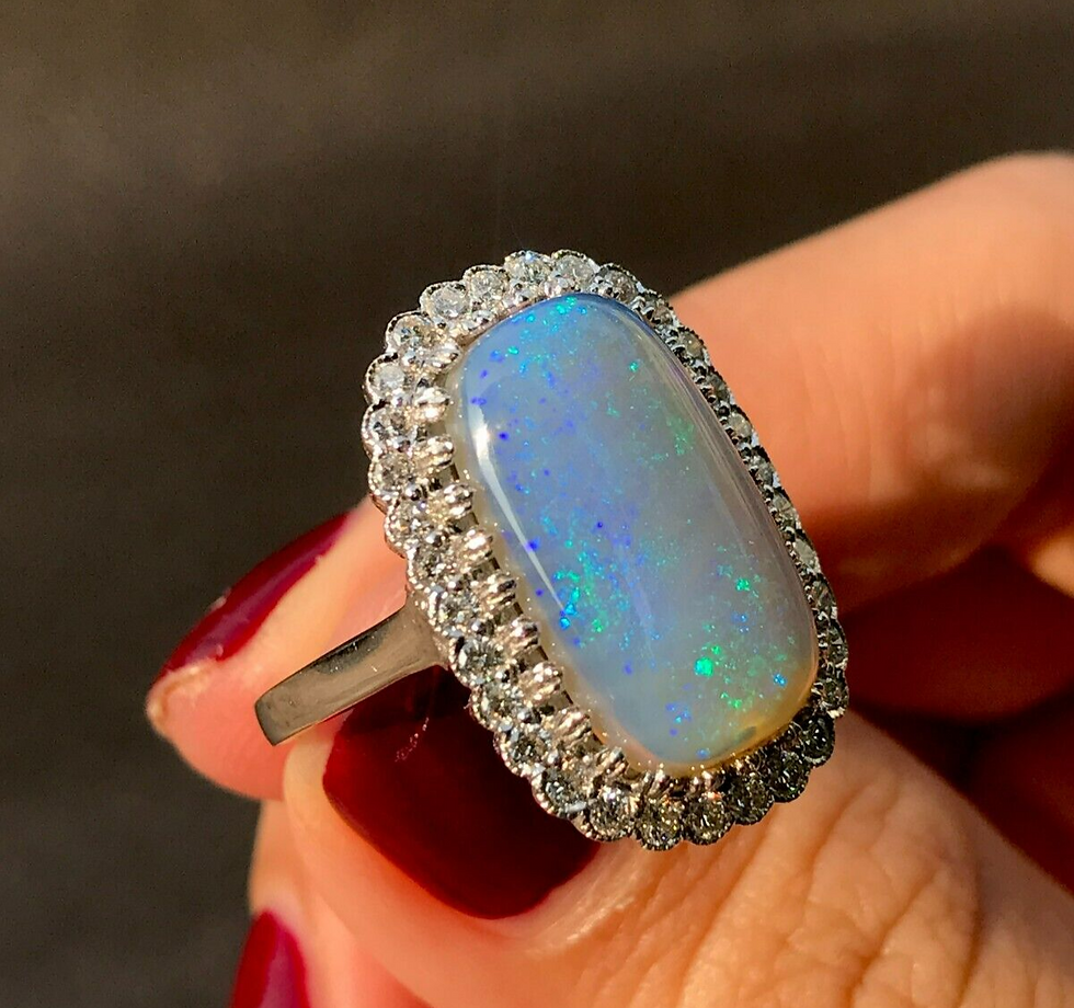 Thumbnail: Antique Inspired 18k Gold Large Cabochon Opal & Diamond Halo Cocktail Ring