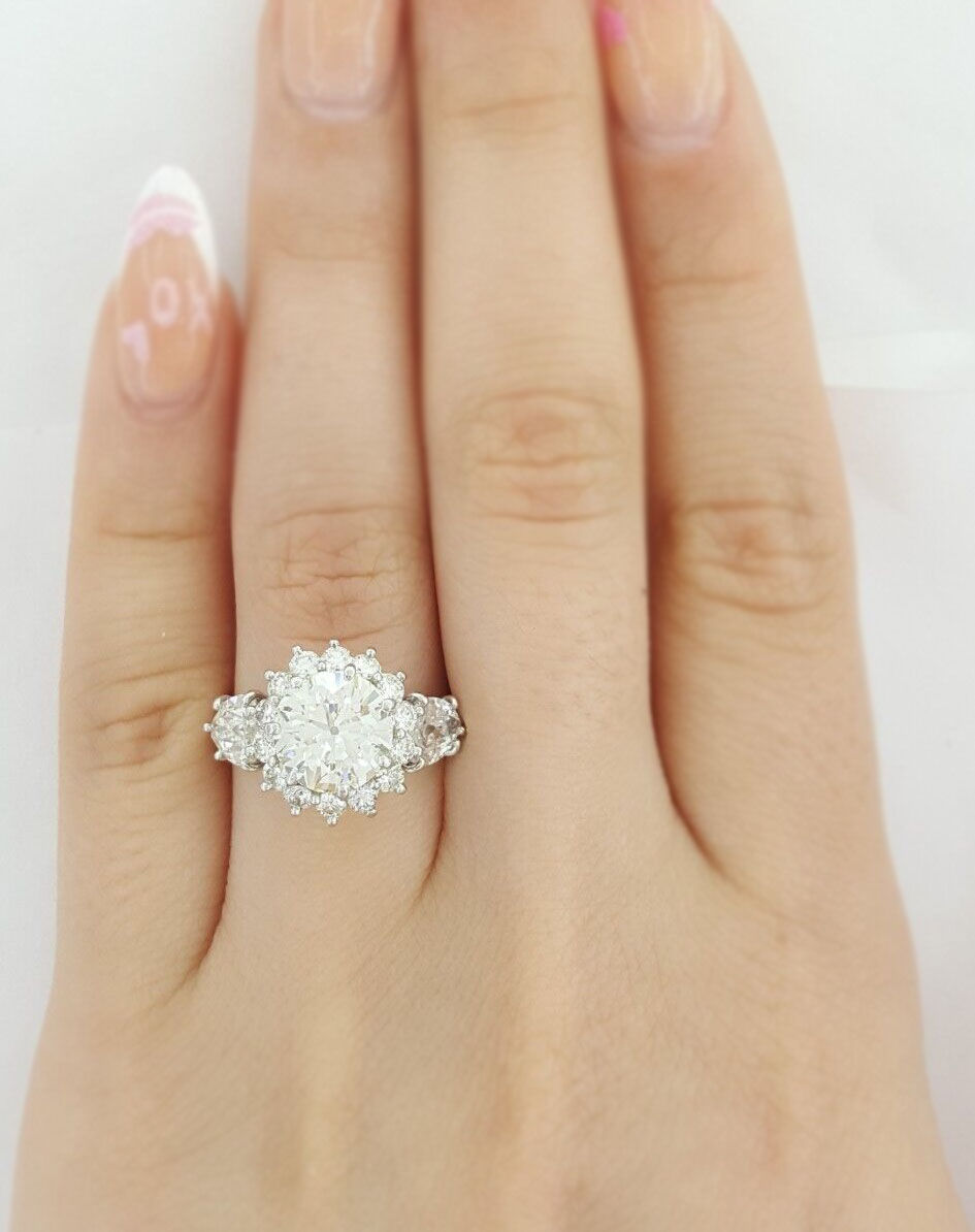Thumbnail: Antique Vintage Platinum 3.96ctw Old European Diamond Pear Halo Engagement Ring