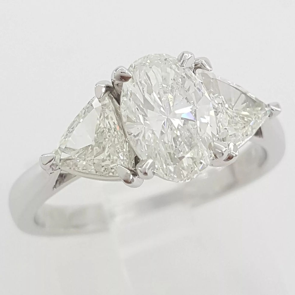 Thumbnail: Platinum 1.80ctw Oval Diamond and Trillion Cut Platinum 1.80ctw Oval Diamond and Trillion Cut 3 Stone 3 Stone Engagement Ring